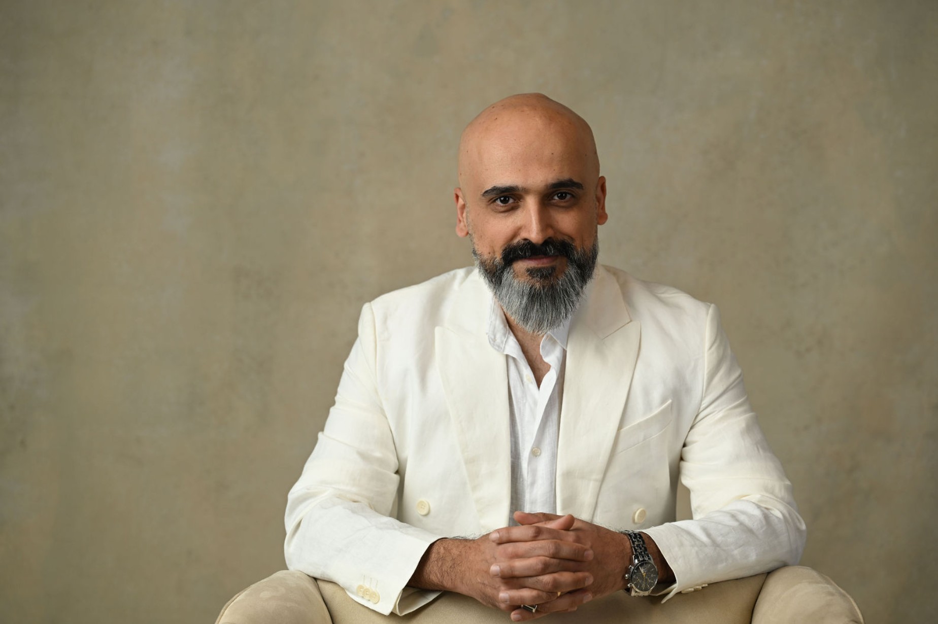 Hamed Ashouri in a calm ivory editorial setting